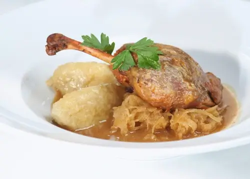 Recipe - Confit Duck with Sauerkraut, Braised Red Cabbage, and South Bohemian Fluffy Dumplings ("Drbáky")